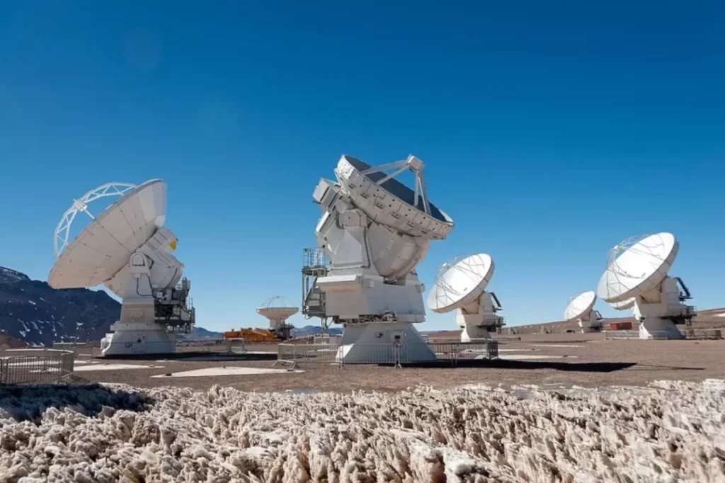 A picture of the array of 66 ALMA radio telescopes in Chile