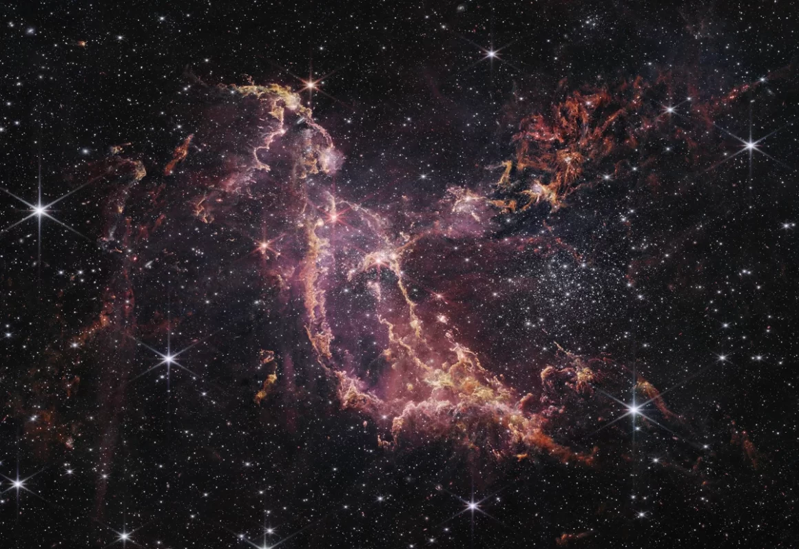 Il telescopio spaziale James Webb ha scoperto nella regione NGC 346 della Piccola Nube di Magellano una regione di formazione stellare